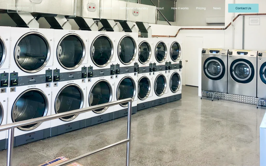 Stacked dryers and front-loading washers at The Laundry Room Feilding, Manawatū