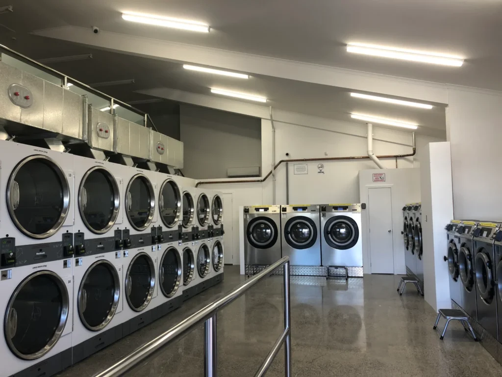 Dryers and washers inside The Laundry Room Main Street laundromat, Palmerston North