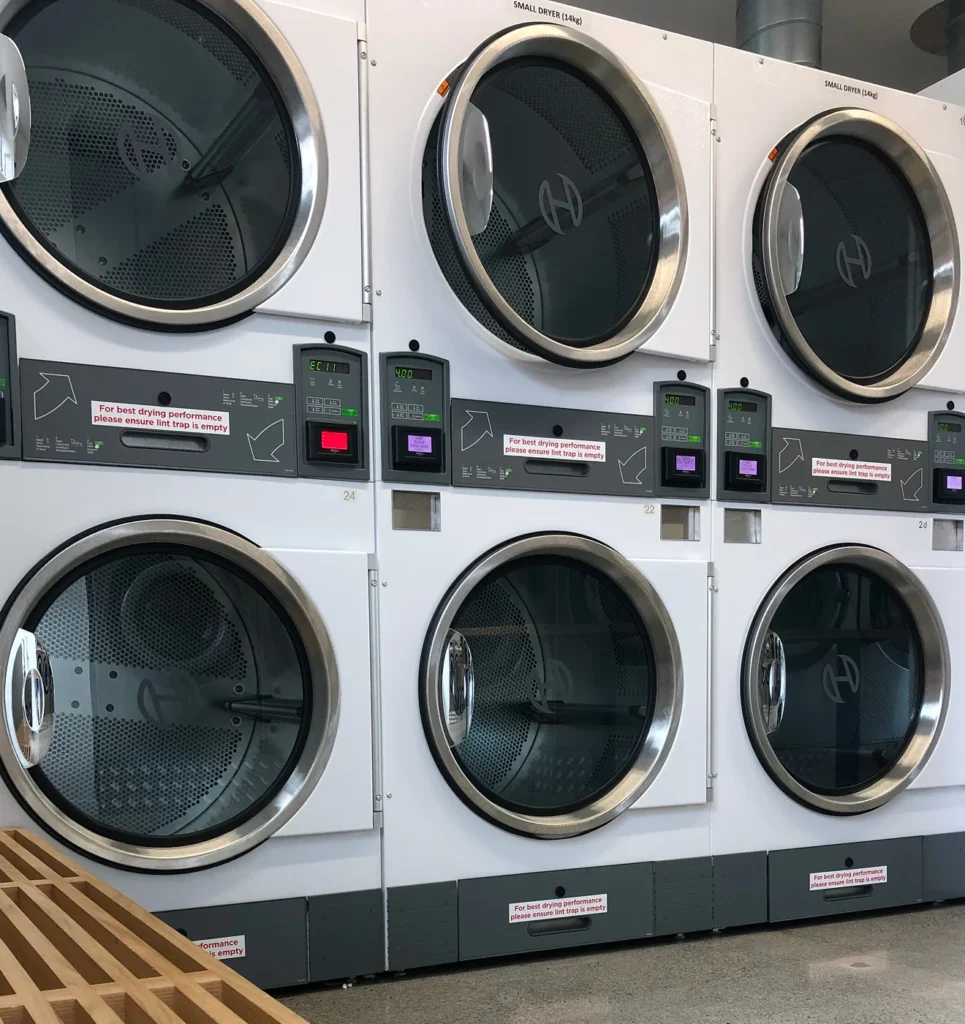 Stacked commercial dryers with card payment panels